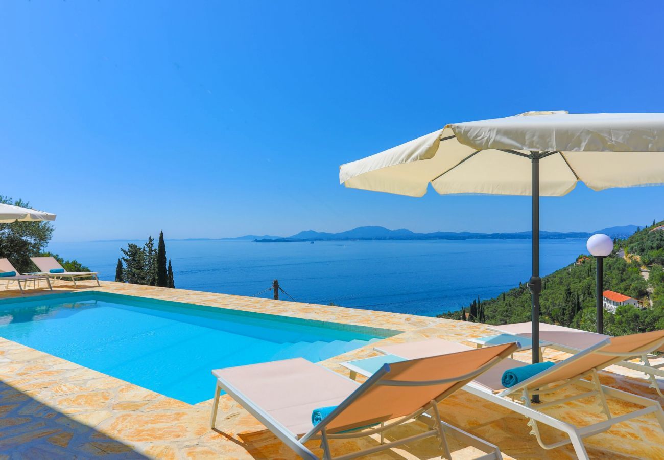 Villa Krouzeri is a detached villa with private pool and panoramic sea view in Agni Bay, Corfu