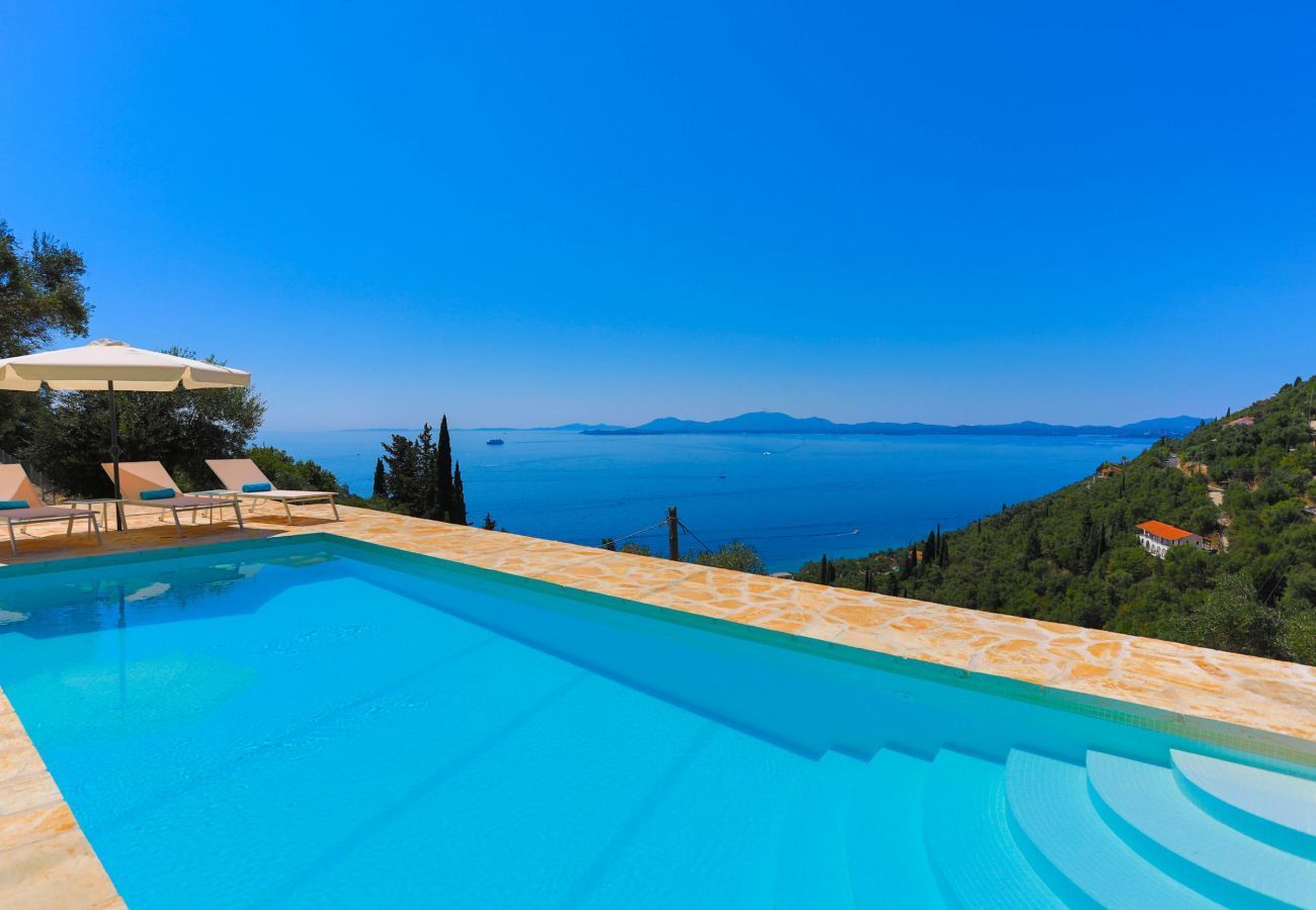 Villa Krouzeri is a detached villa with private pool and panoramic sea view in Agni Bay, Corfu