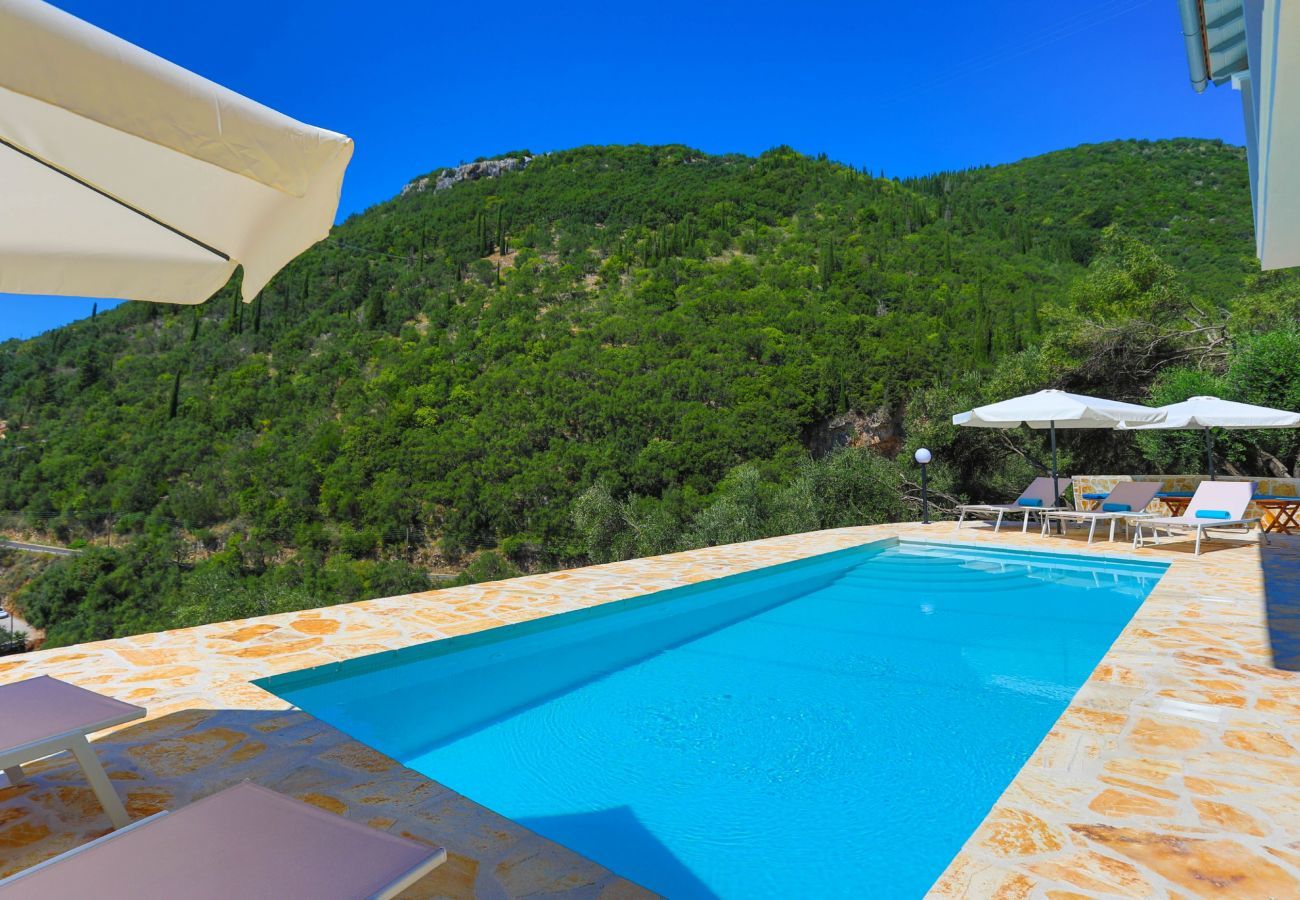 Villa Krouzeri is a detached villa with private pool and panoramic sea view in Agni Bay, Corfu