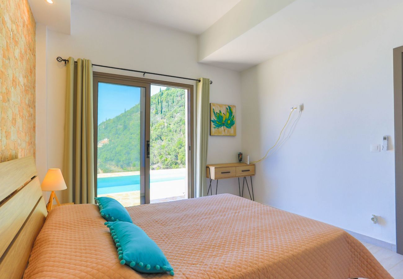 Villa Krouzeri is a detached villa with private pool and panoramic sea view in Agni Bay, Corfu