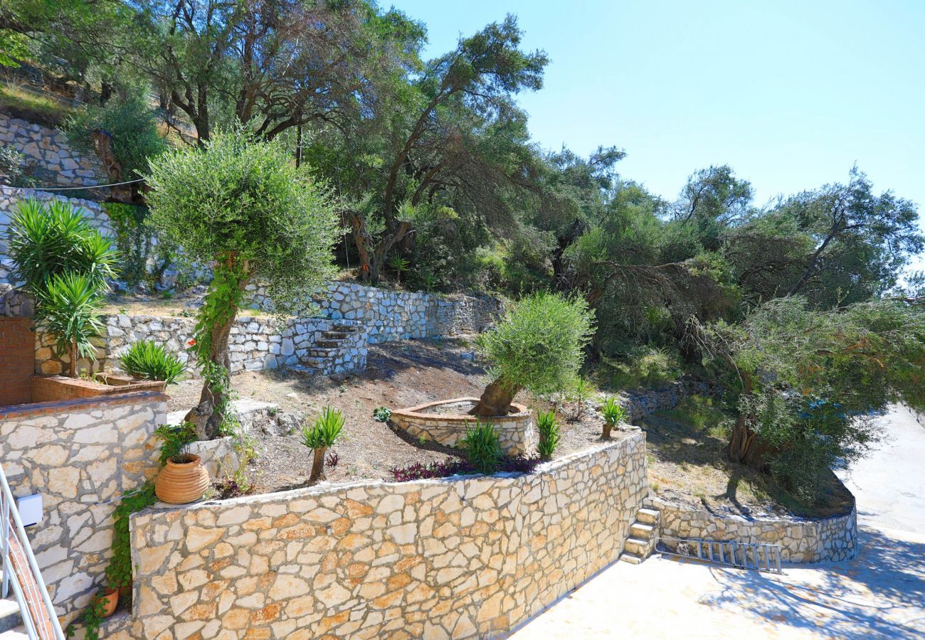 Villa Krouzeri is a detached villa with private pool and panoramic sea view in Agni Bay, Corfu