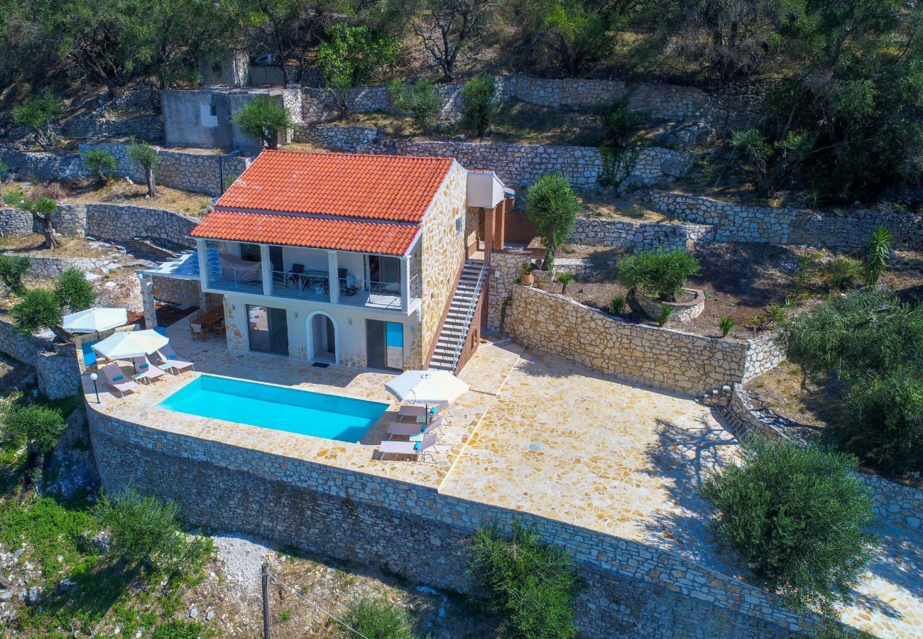 Villa Krouzeri is a detached villa with private pool and panoramic sea view in Agni Bay, Corfu