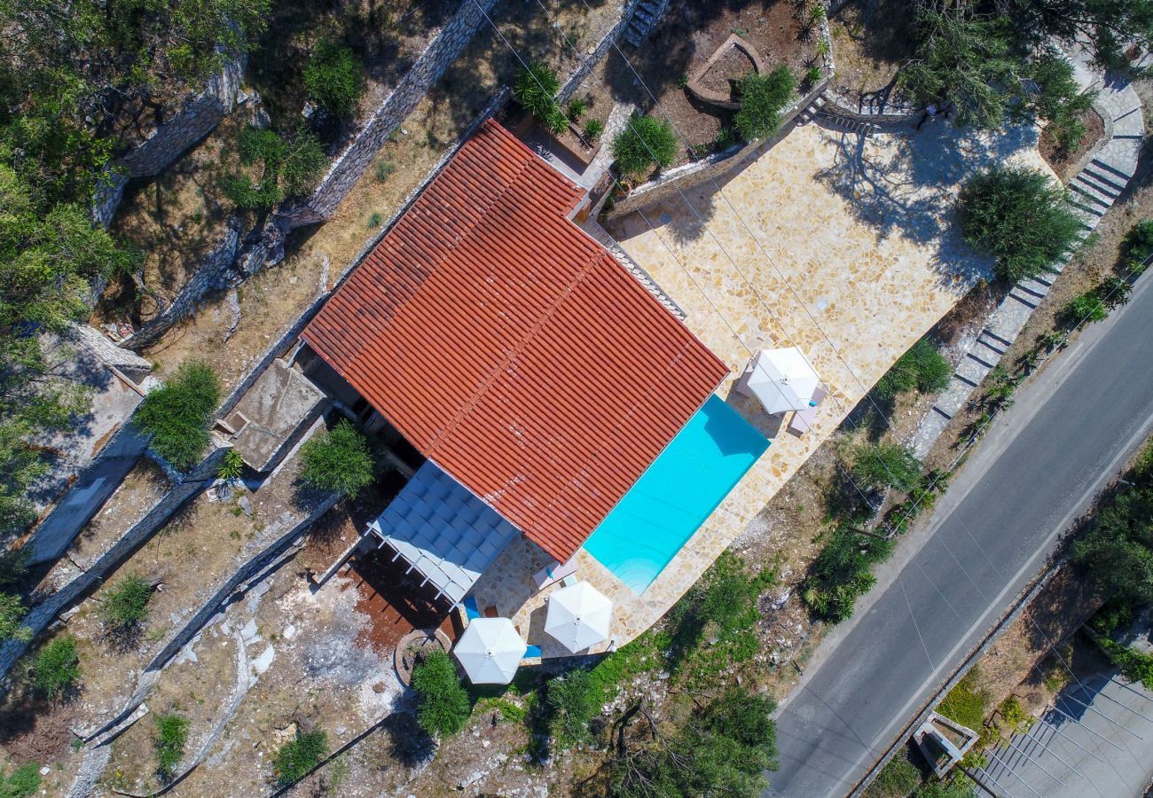 Villa Krouzeri is a detached villa with private pool and panoramic sea view in Agni Bay, Corfu