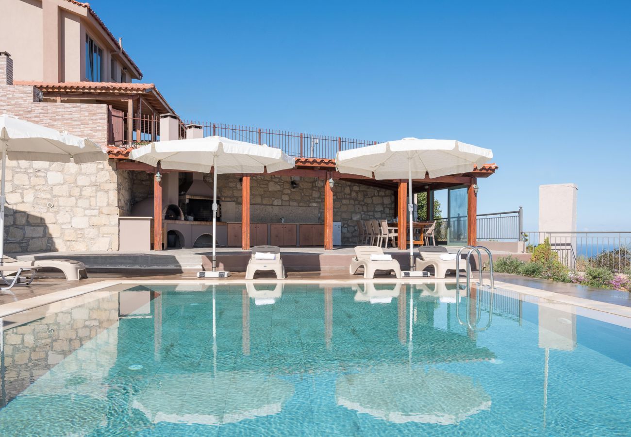 Villa Harmonia is a cozy detached villa with private pool and panoramic view over the sea in Lygaria, Crete