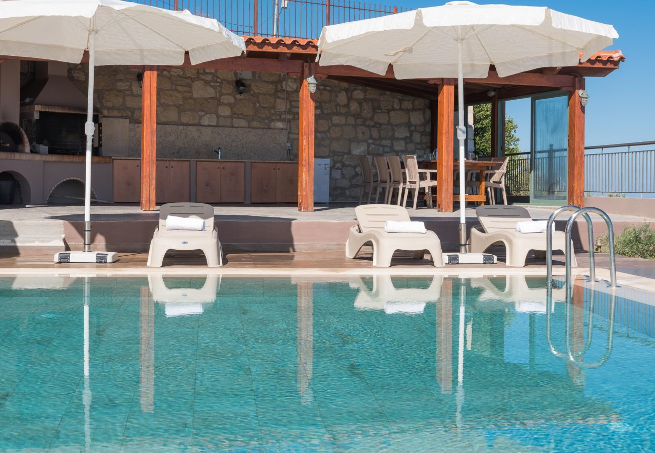 Villa Harmonia is a cozy detached villa with private pool and panoramic view over the sea in Lygaria, Crete