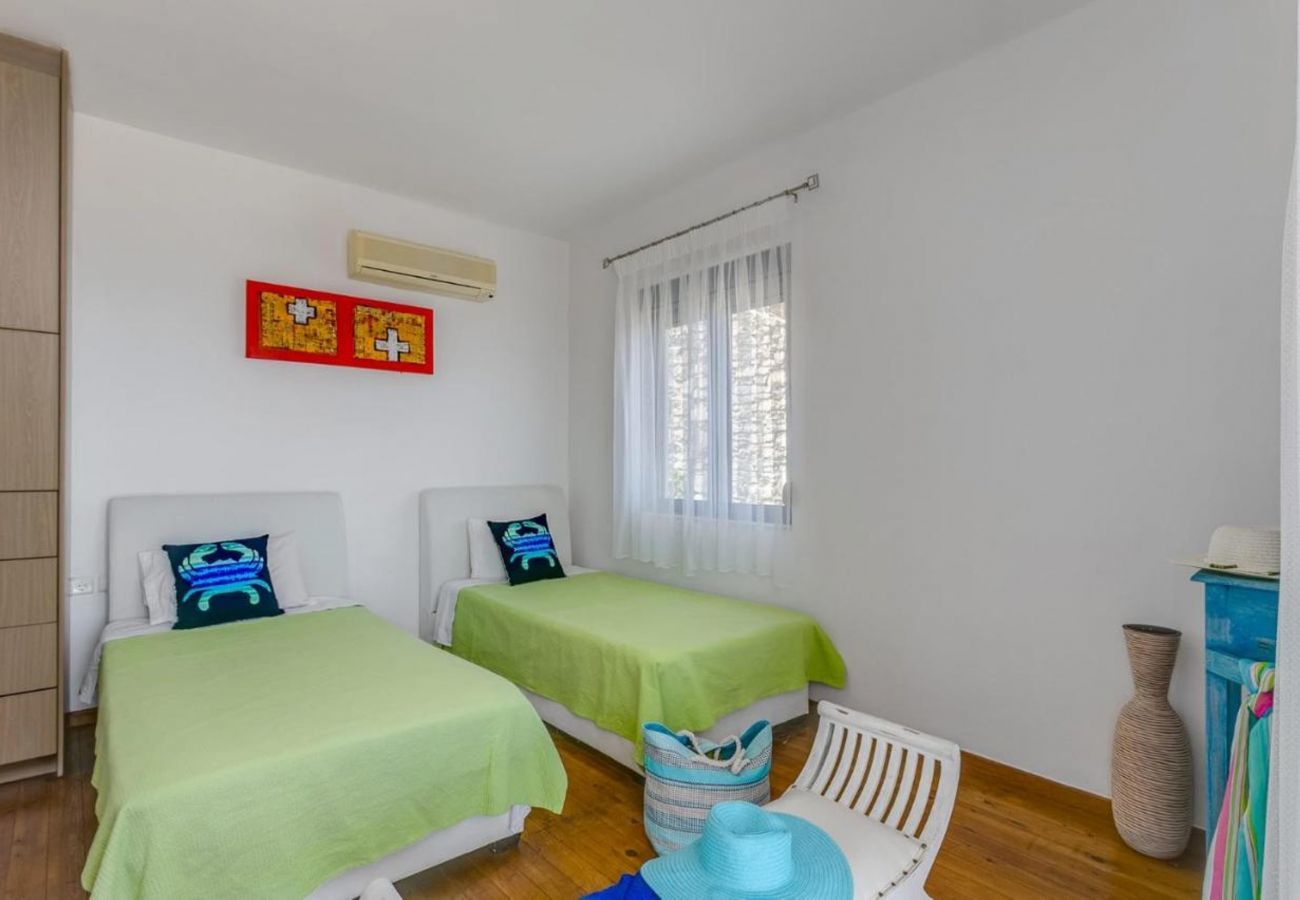 Villa Elounda is a detached villa with private pool and panoramic view over the sea located on a mountain in Elounda, Crete