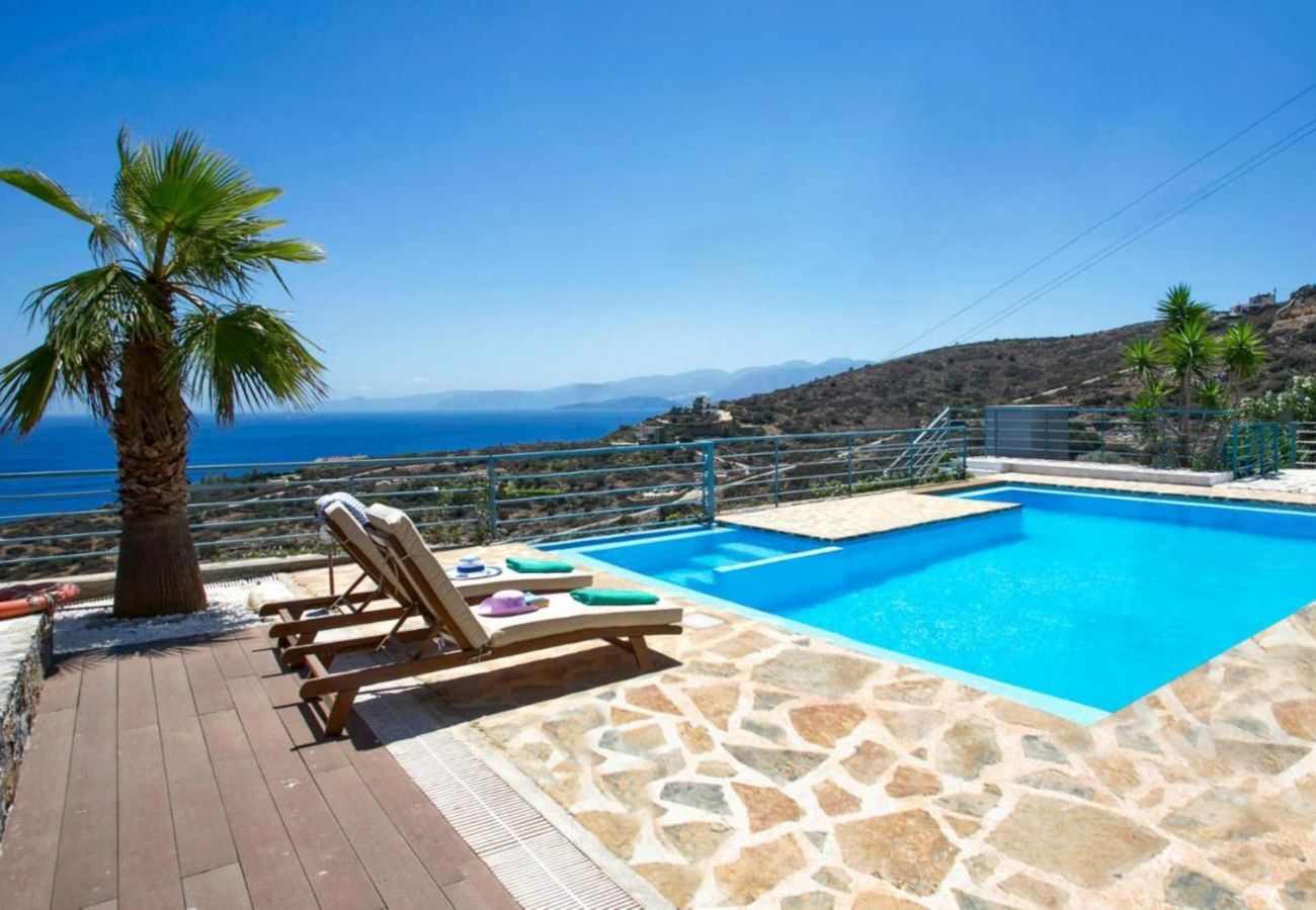 Villa Elounda is a detached villa with private pool and panoramic view over the sea located on a mountain in Elounda, Crete