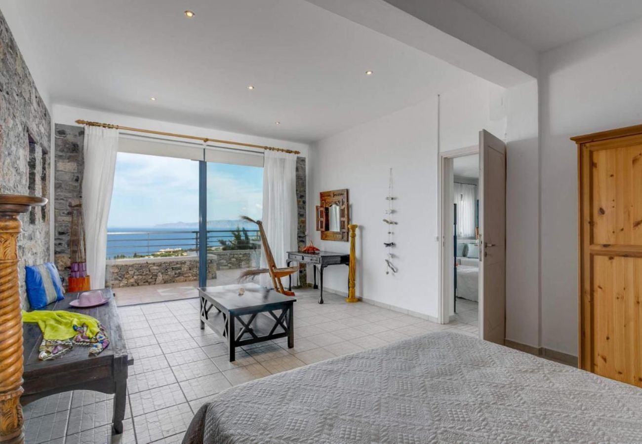 Villa Elounda is a detached villa with private pool and panoramic view over the sea located on a mountain in Elounda, Crete