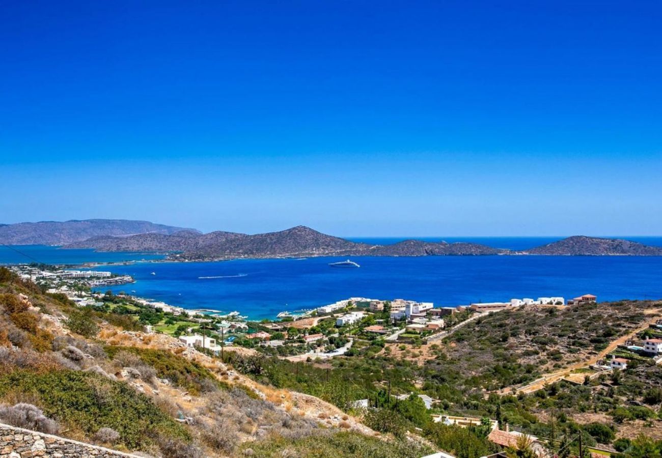 Villa Elounda is a detached villa with private pool and panoramic view over the sea located on a mountain in Elounda, Crete