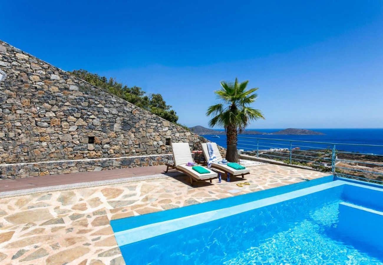 Villa Elounda is a detached villa with private pool and panoramic view over the sea located on a mountain in Elounda, Crete