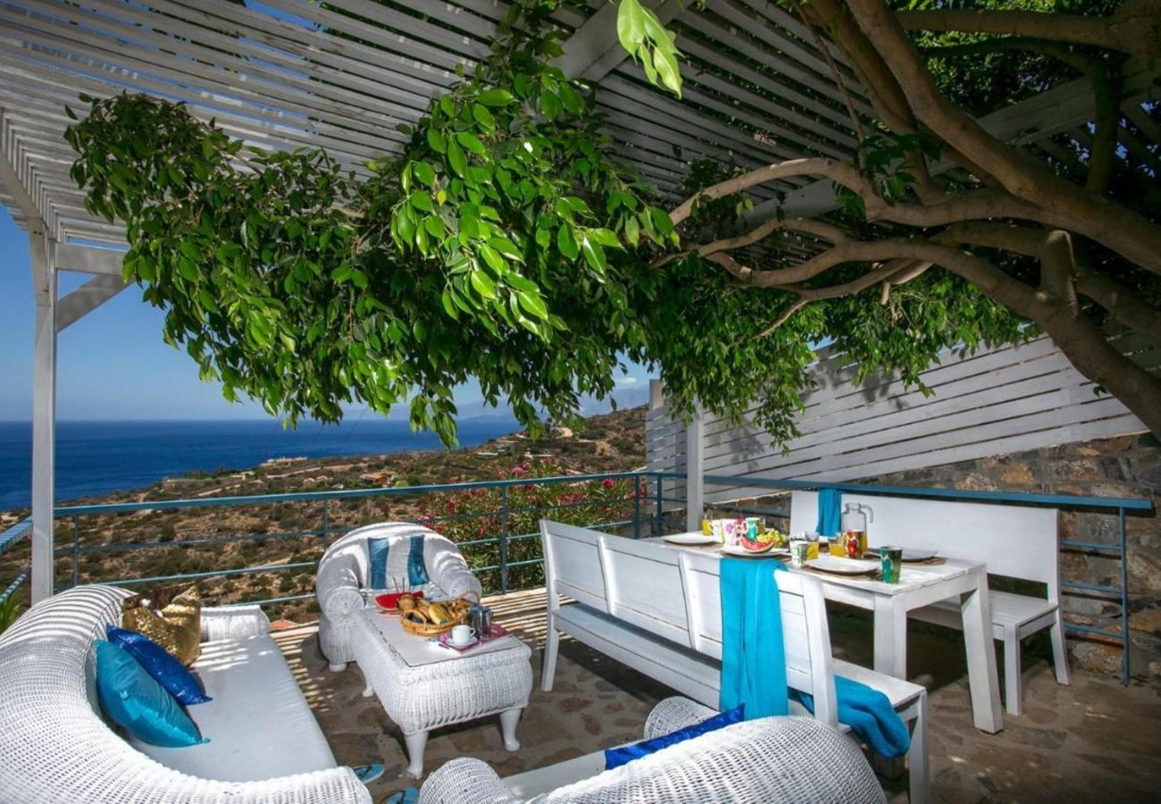 Villa Elounda is a detached villa with private pool and panoramic view over the sea located on a mountain in Elounda, Crete