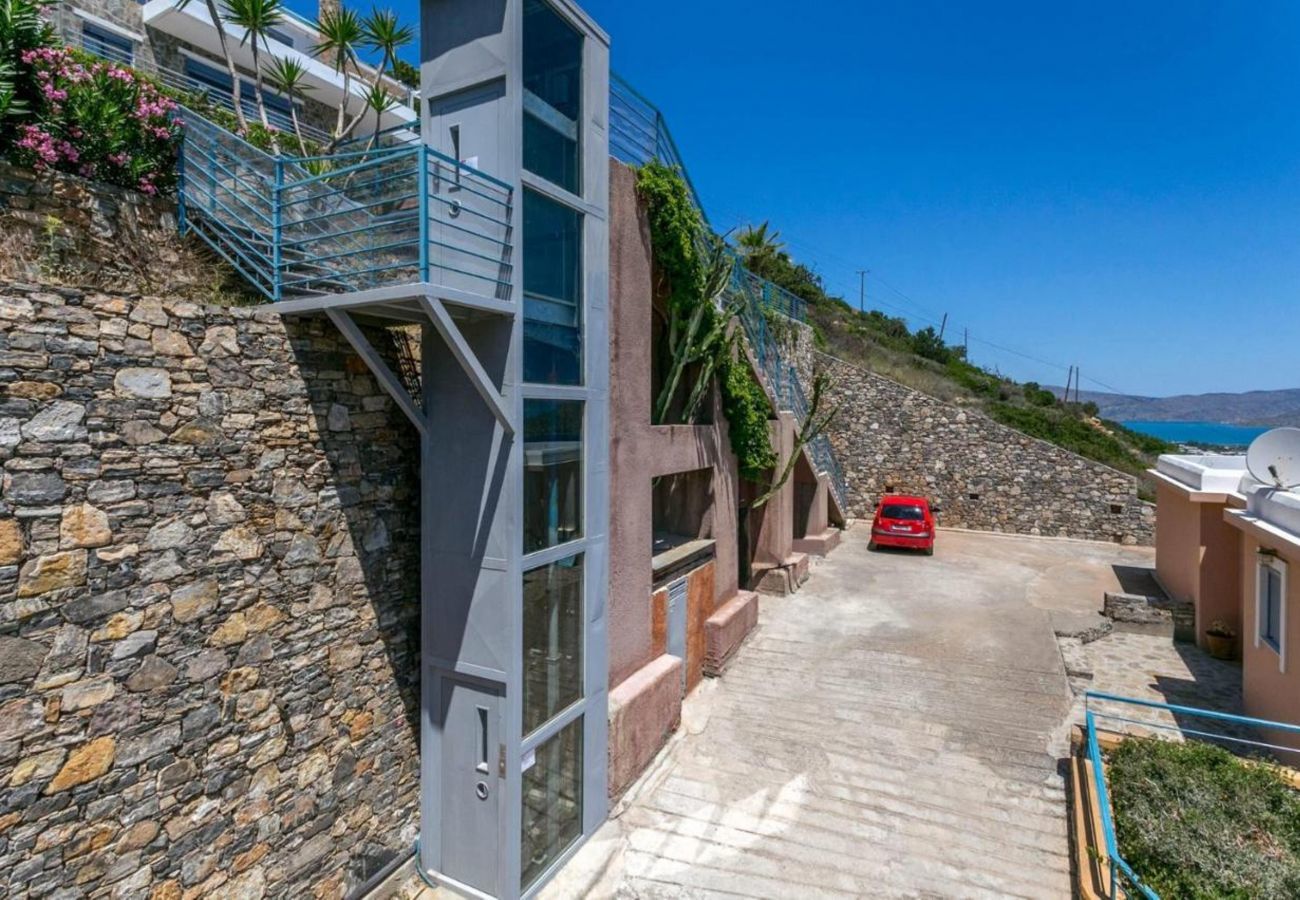 Villa Elounda is a detached villa with private pool and panoramic view over the sea located on a mountain in Elounda, Crete
