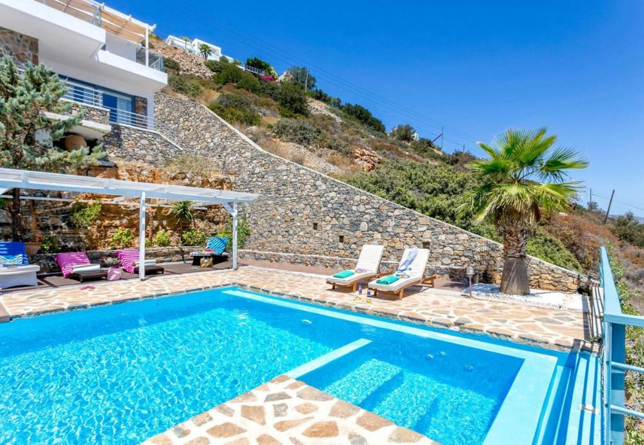 Villa Elounda is a detached villa with private pool and panoramic view over the sea located on a mountain in Elounda, Crete