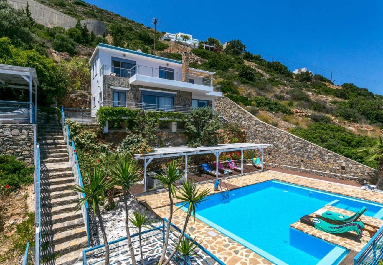 Villa Elounda is a detached villa with private pool and panoramic view over the sea located on a mountain in Elounda, Crete