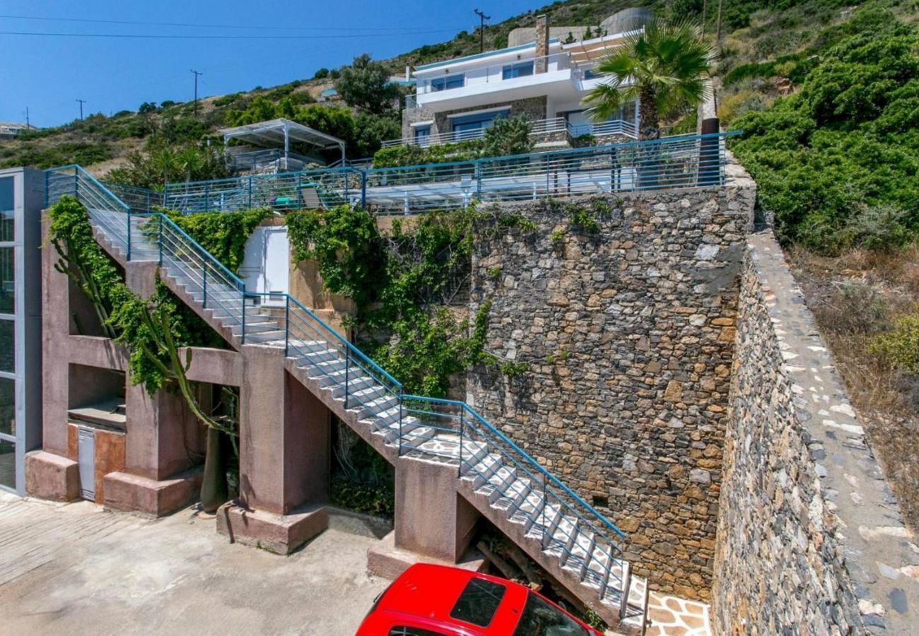 Villa Elounda is a detached villa with private pool and panoramic view over the sea located on a mountain in Elounda, Crete