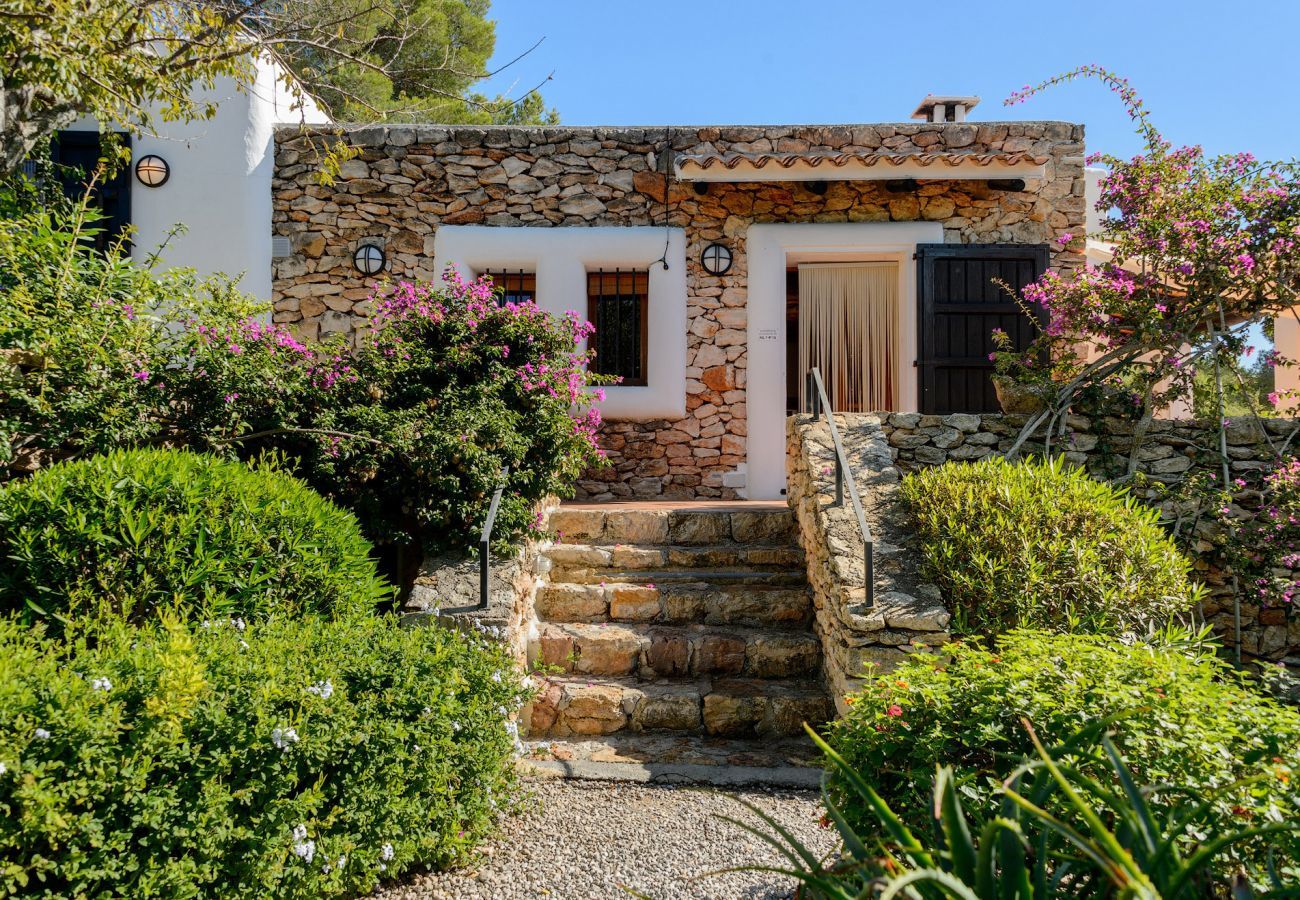 Casa Lila is a stylish holiday home with pool, garden and privacy walking distance of San Carlos, Ibiza