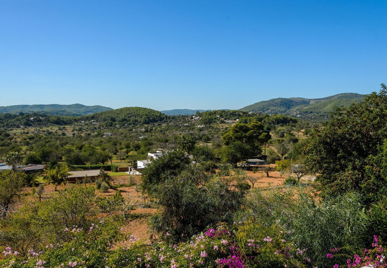 Casa Lila is a stylish holiday home with pool, garden and privacy walking distance of San Carlos, Ibiza