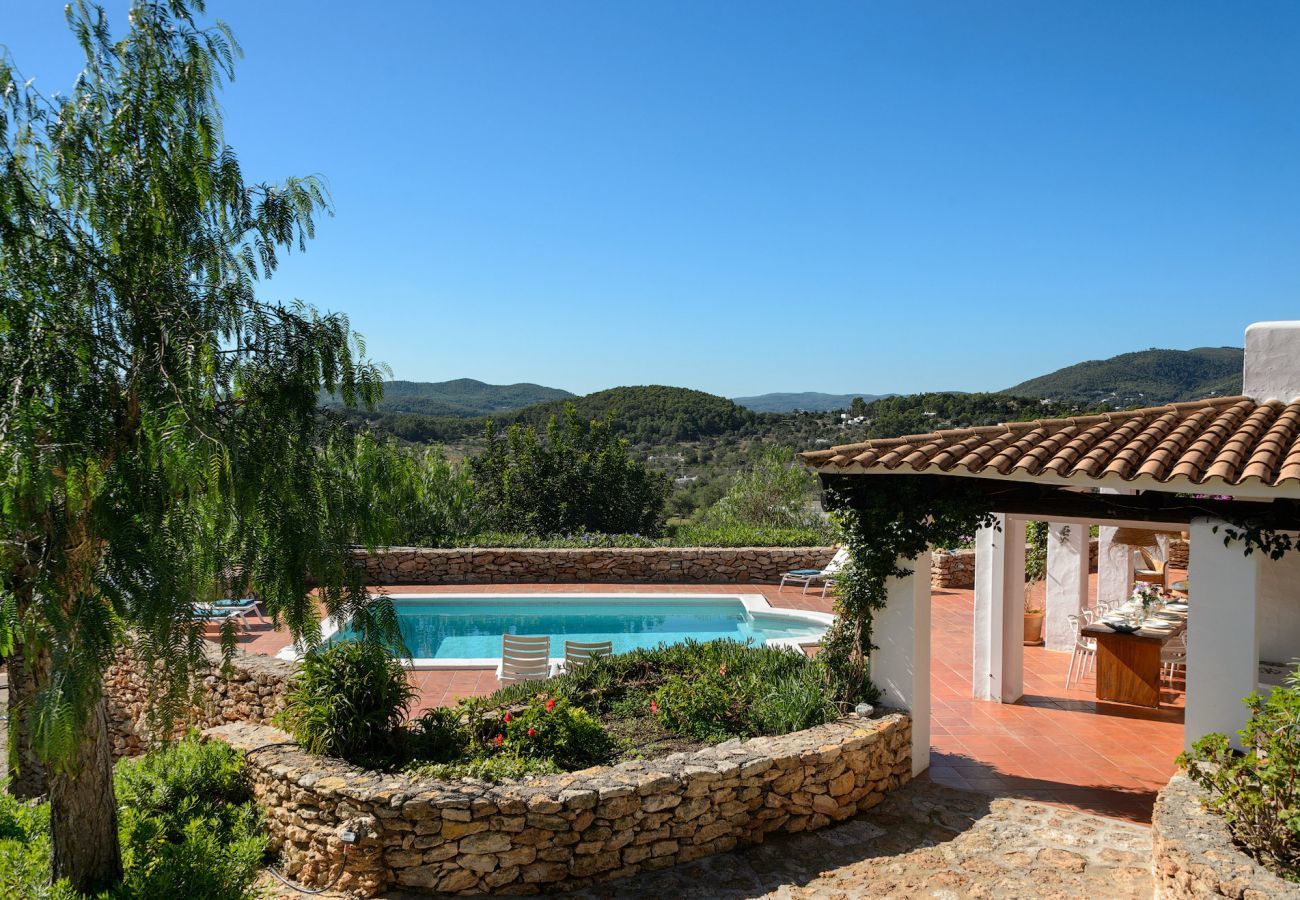 Casa Lila is a stylish holiday home with pool, garden and privacy walking distance of San Carlos, Ibiza