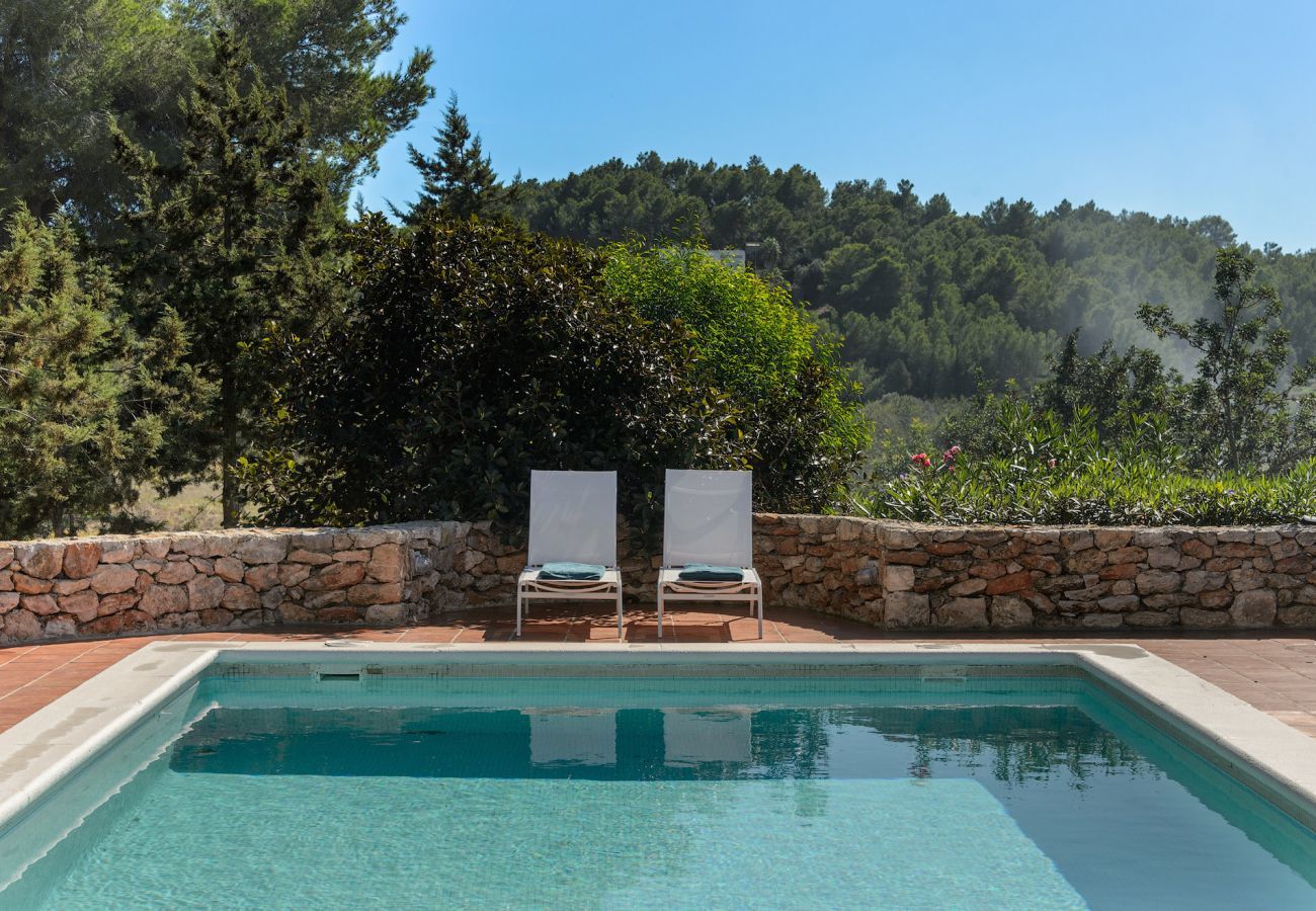 Casa Lila is a stylish holiday home with pool, garden and privacy walking distance of San Carlos, Ibiza
