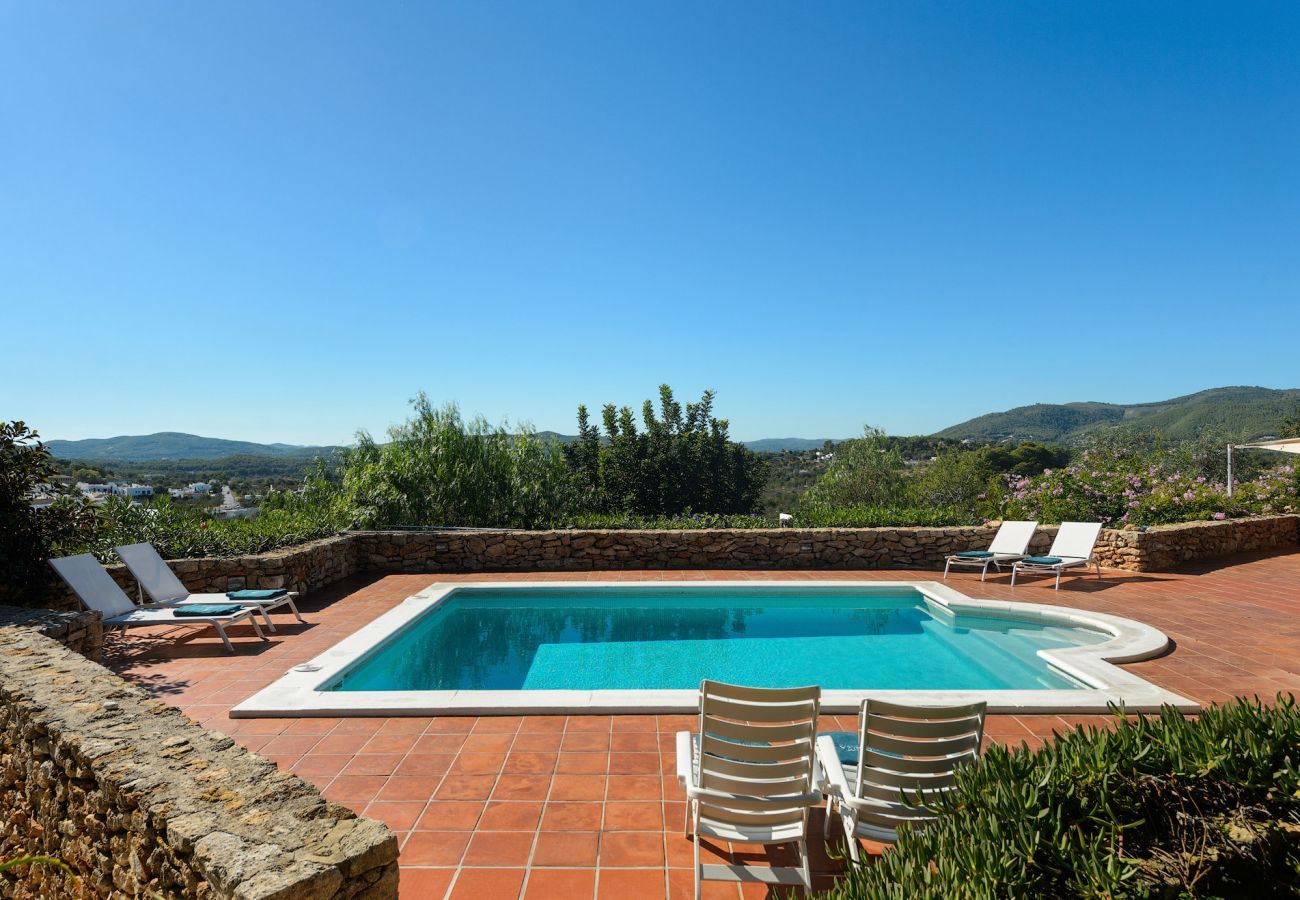 Casa Lila is a stylish holiday home with pool, garden and privacy walking distance of San Carlos, Ibiza