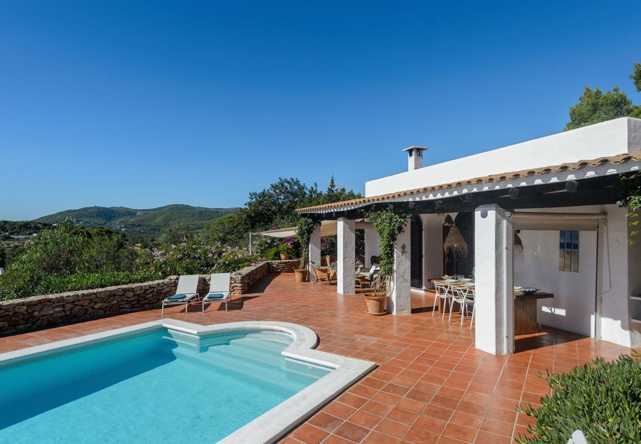 Casa Lila is a stylish holiday home with pool, garden and privacy walking distance of San Carlos, Ibiza