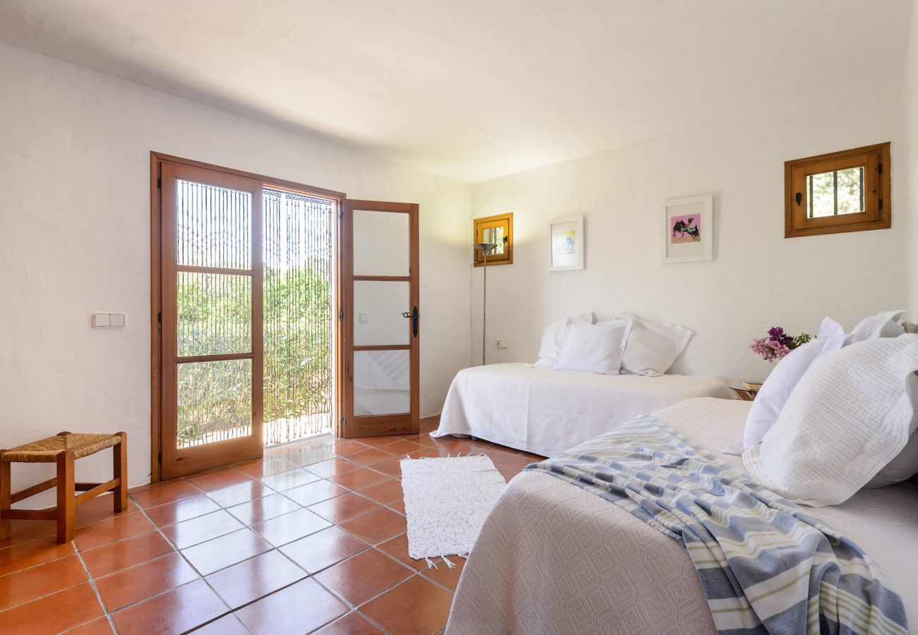 Casa Lila is a stylish holiday home with pool, garden and privacy walking distance of San Carlos, Ibiza