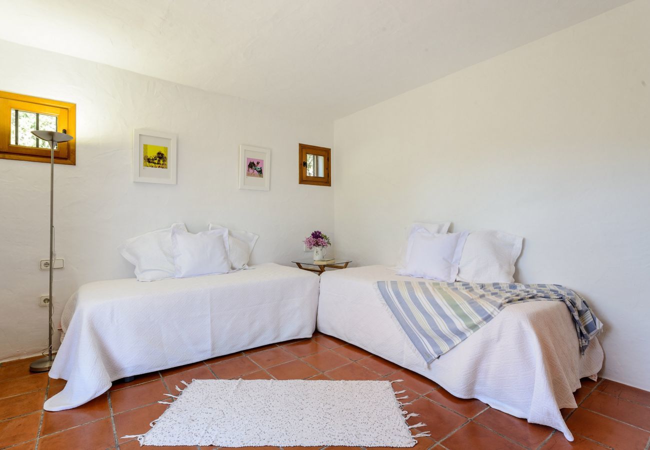 Casa Lila is a stylish holiday home with pool, garden and privacy walking distance of San Carlos, Ibiza