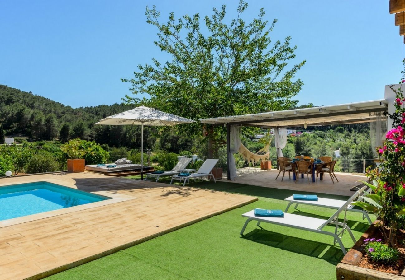 Villa Belicia has a spacious private pool and lots of privacy. With comfortable garden. In Santa Eulalia, Ibiza