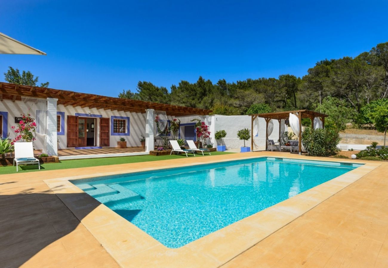 Villa Belicia has a spacious private pool and lots of privacy. With comfortable garden. In Santa Eulalia, Ibiza