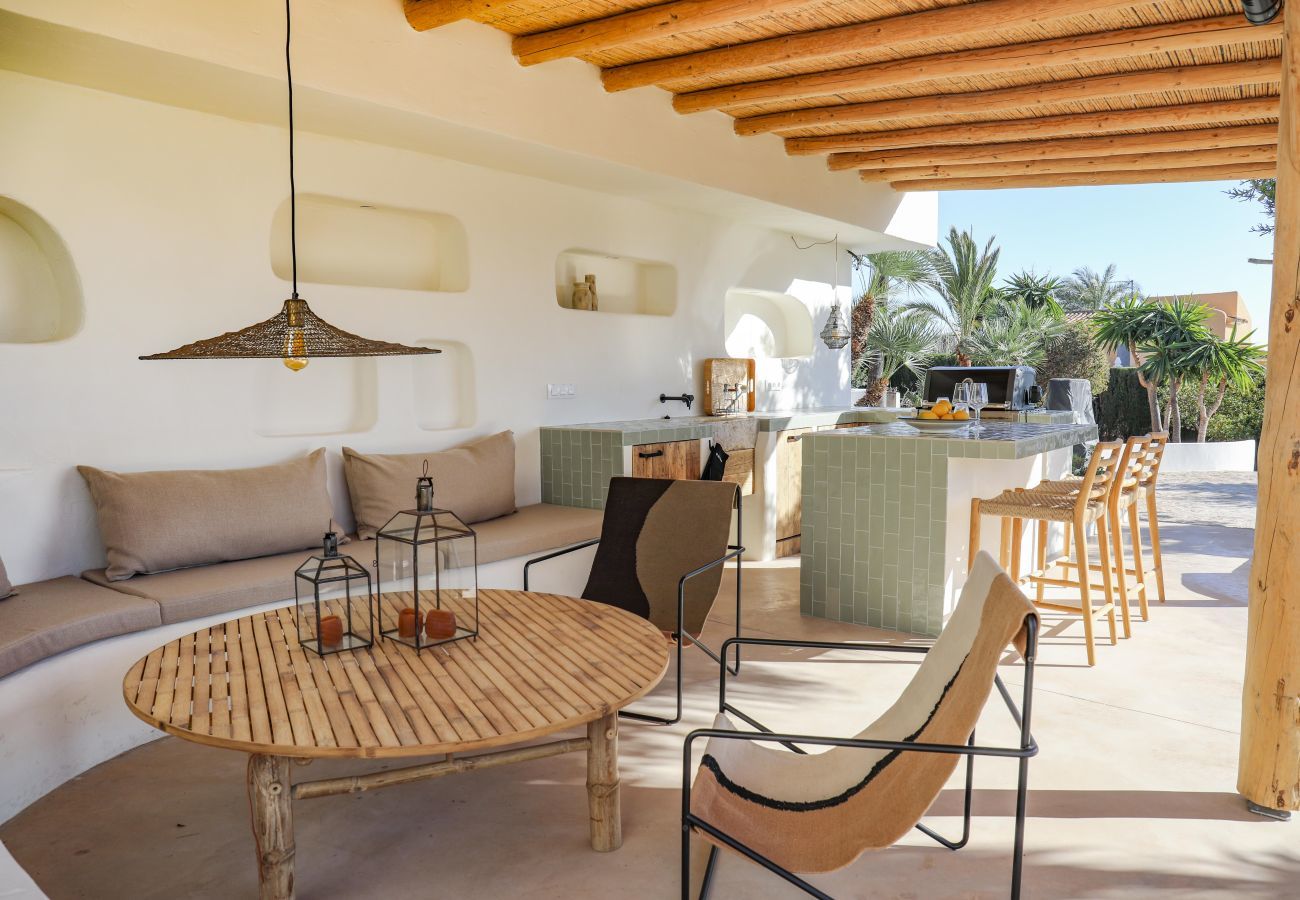 Comfortable seating area  Comfortable seating area with covered outdoor kitchen