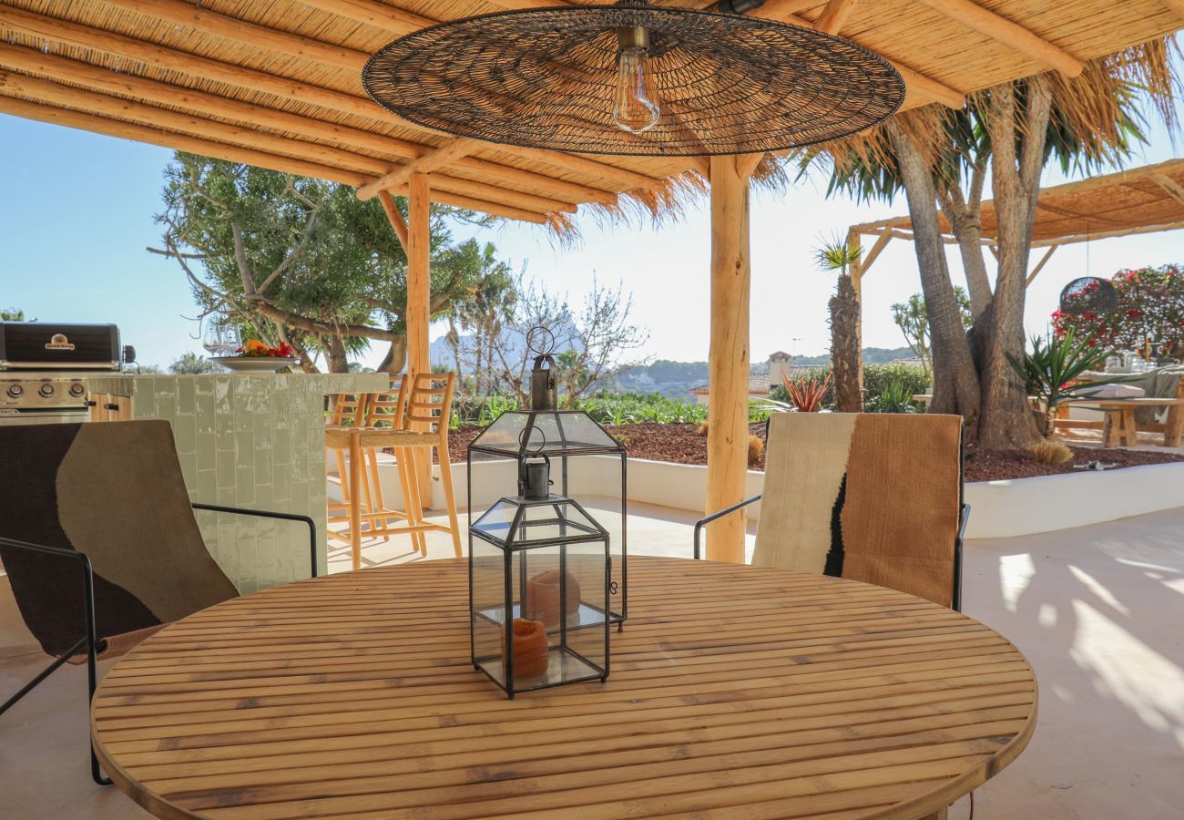 Covered lounge area with view Covered lounge area near the outside kitchen with a view