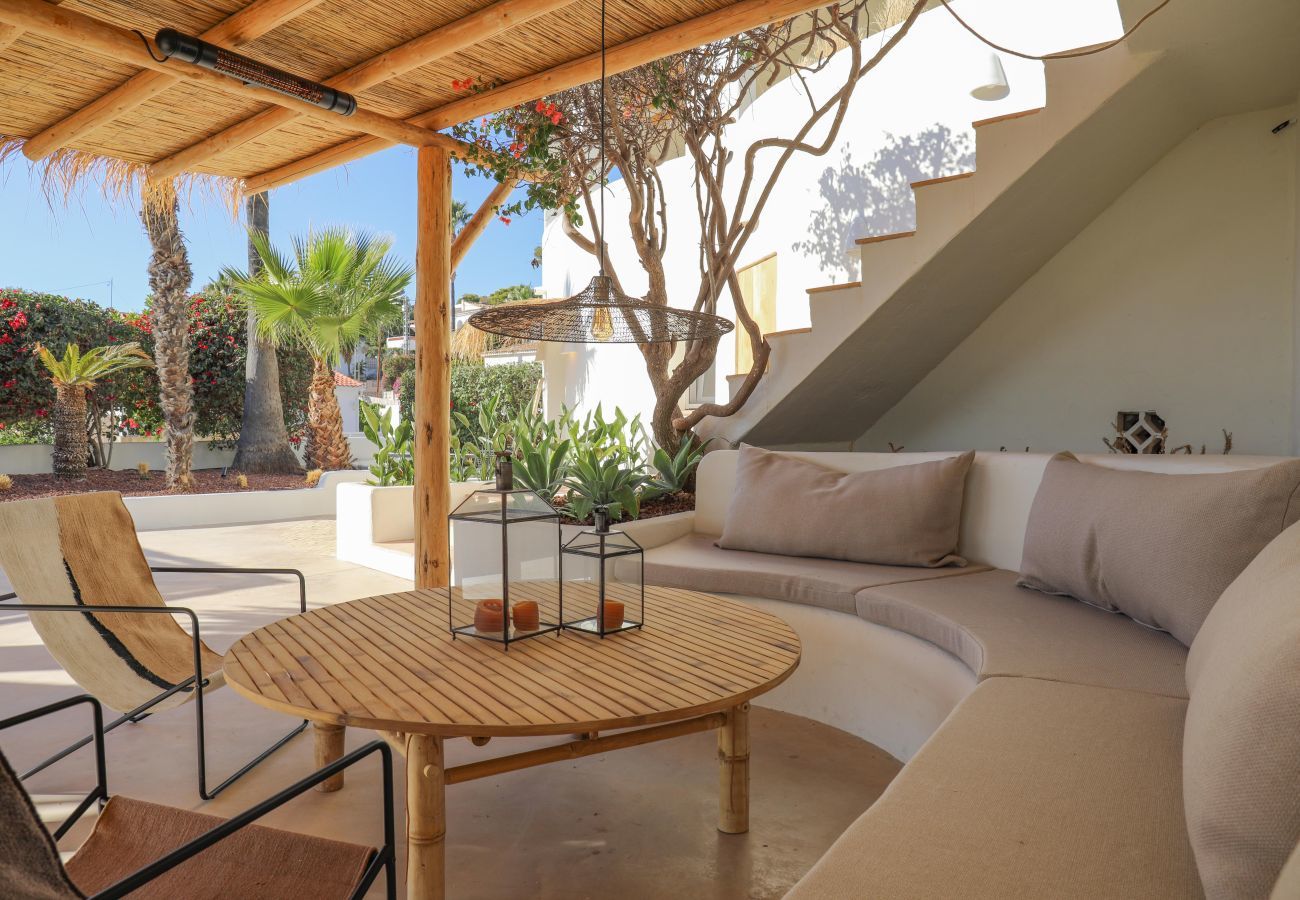 Seating area under covered terrace Comfortable seating area under covered terrace