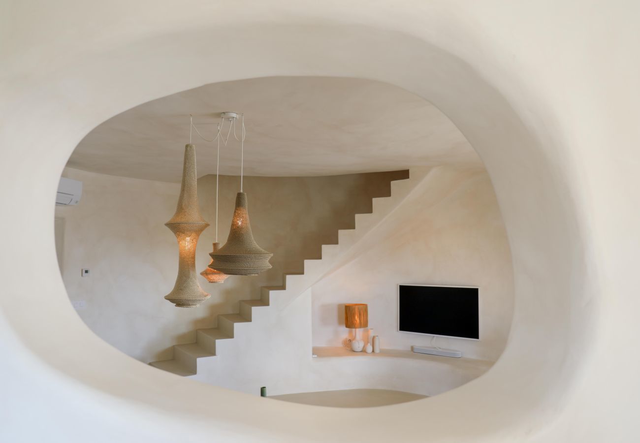 Staircase with round design Staircase with round design in the living room